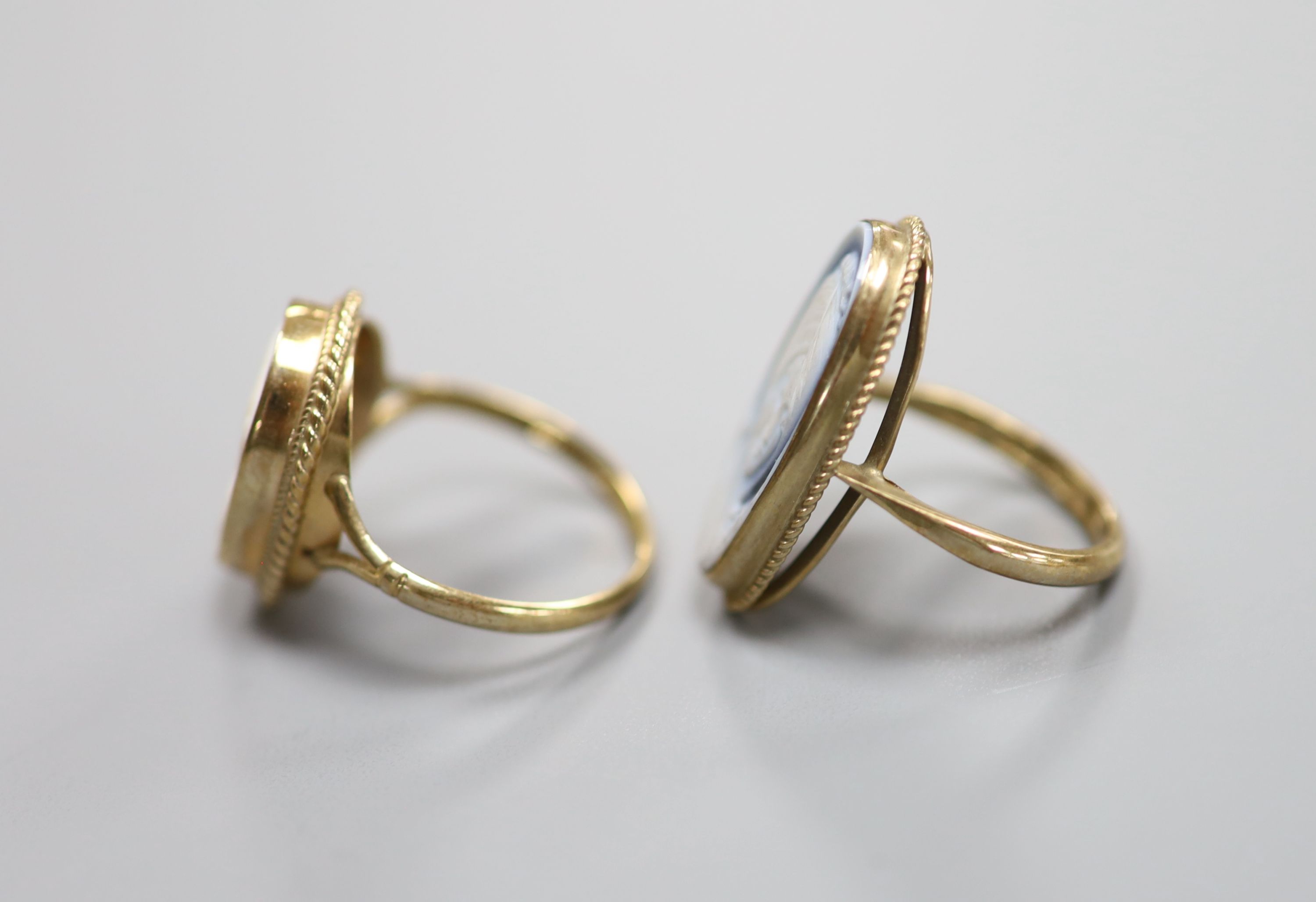 Two modern 9ct gold and Wedgwood style plaque set dress rings, sizes J/K & P